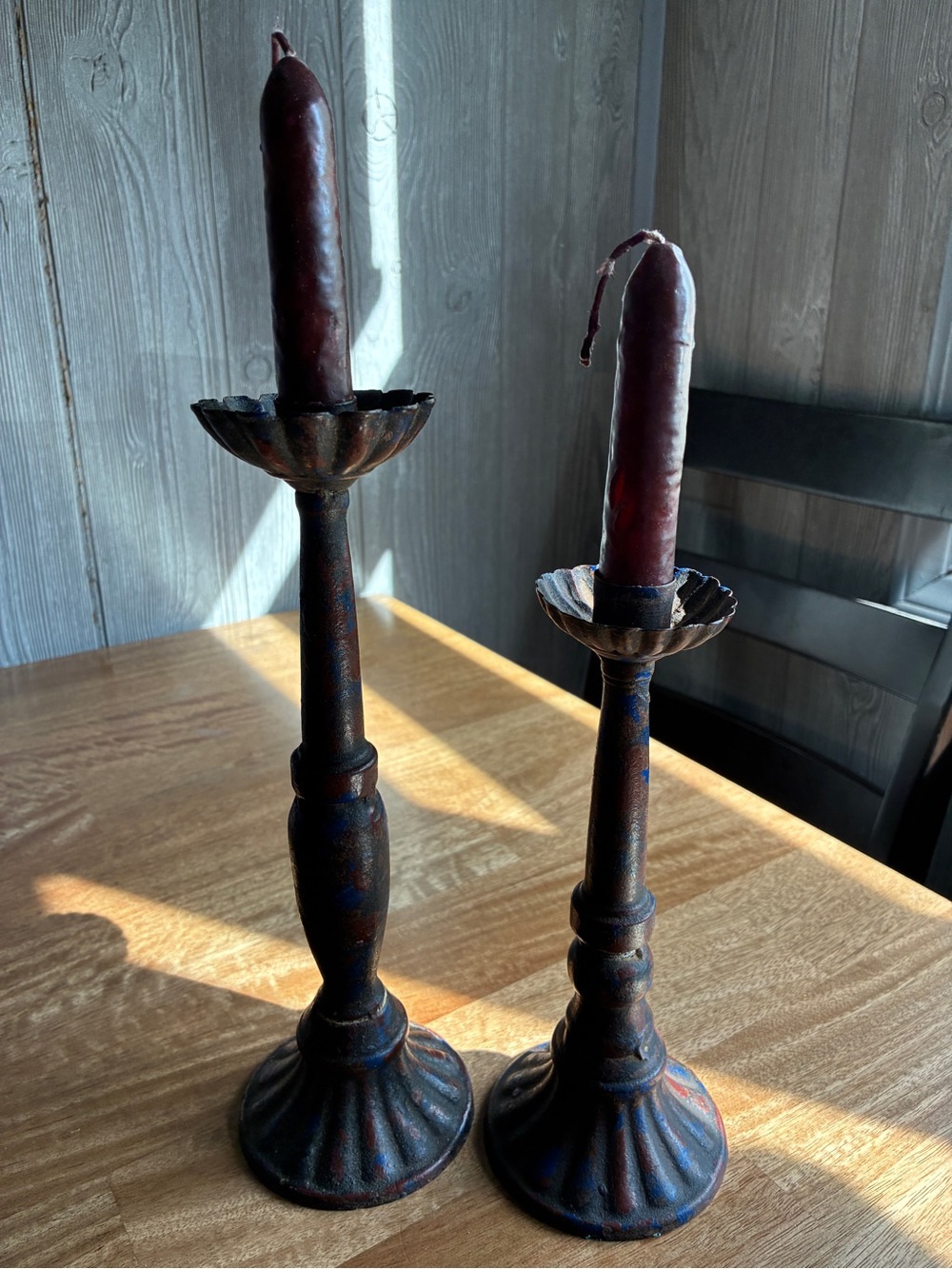 Decorative Rustic Metal Candlestick Pair with Burgundy Candles